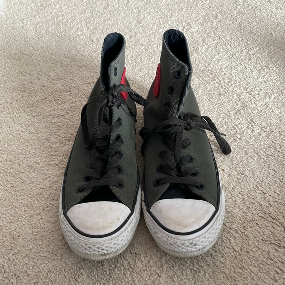 Converse. Green high top shoes. Women’s size 10, men’s size 8.